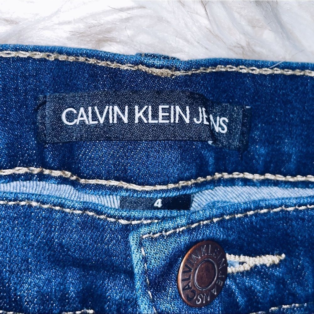 Calvin Klein High Rise Raw Hem Denim Shorts - Picture 5 of 9